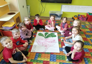 zespół ze swoim plakatem